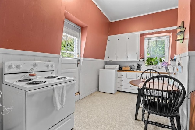 kitchen featuring white range with electric stovetop, washer / dryer, white cabinetry, ornamental molding, and a wainscoted wall