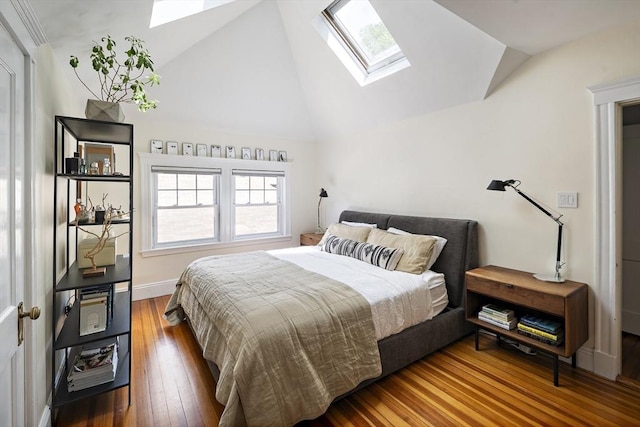 49 Prince St Unit 2, Boston, MA 02130 - bedroom featuring a skylight, hardwood / wood-style flooring, multiple windows, and high vaulted ceiling