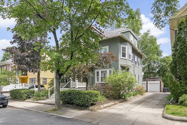 49 Prince St Unit 2, Boston, MA 02130 - view of front of property with an outdoor structure and a garage