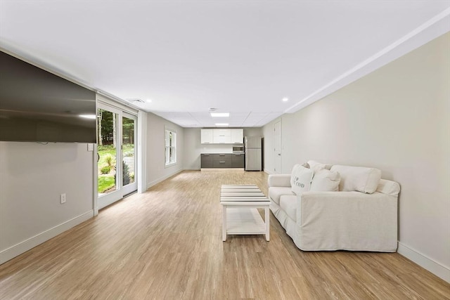 living room featuring light wood-type flooring