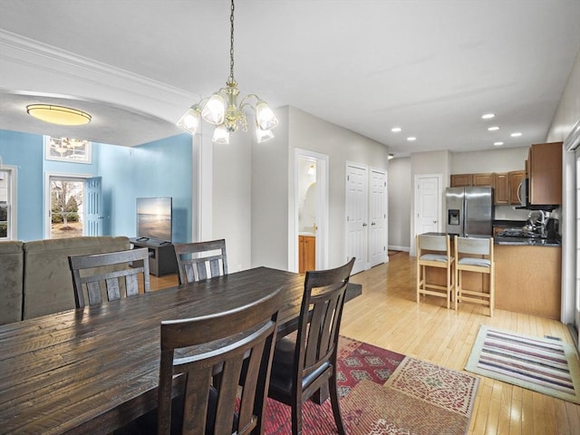 36 Knowlton Cir Unit 36, Upton, MA 01568 - dining space with a chandelier, light wood-style floors, recessed lighting, and arched walkways