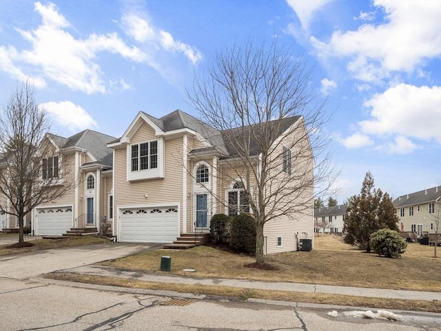 36 Knowlton Cir Unit 36, Upton, MA 01568 - traditional-style home featuring an attached garage and driveway