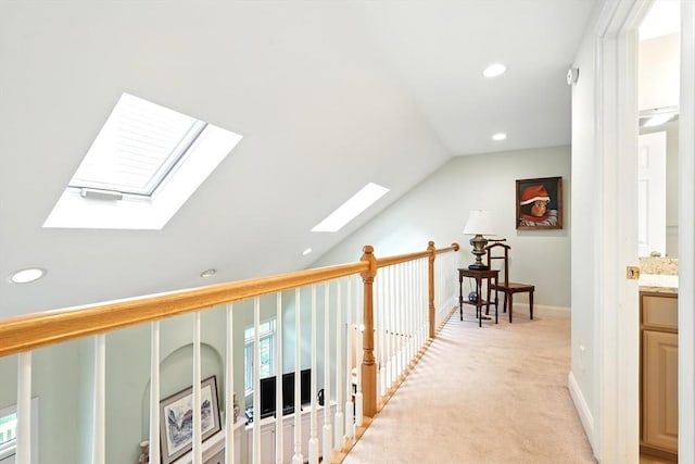 11 High Pine Cir Unit 11, Wilbraham, MA 01095 - hallway featuring a skylight, recessed lighting, vaulted ceiling, light colored carpet, and baseboards