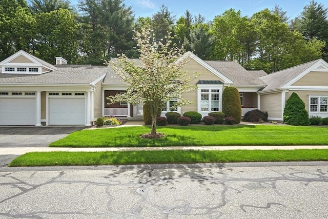 11 High Pine Cir Unit 11, Wilbraham, MA 01095 - view of front of property with an attached garage, asphalt driveway, and a front yard