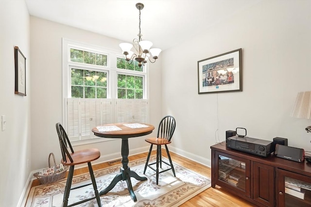 11 High Pine Cir Unit 11, Wilbraham, MA 01095 - dining room featuring a chandelier, light wood-style flooring, baseboards, and a desk