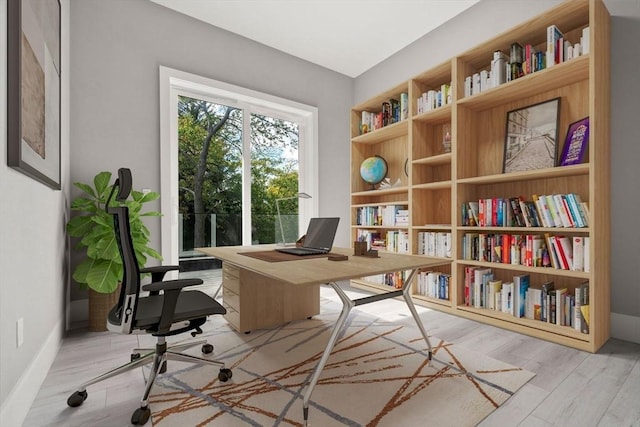 home office with wood finished floors