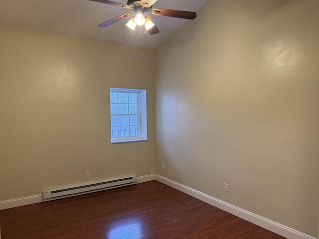 spare room with ceiling fan, dark hardwood / wood-style flooring, vaulted ceiling, and a baseboard heating unit