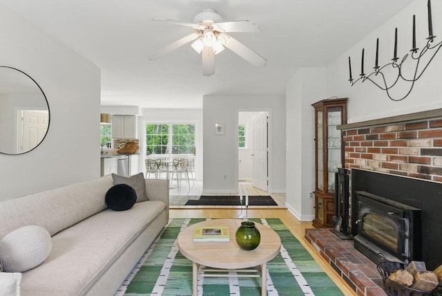 507 Towne St, North Attleboro, MA 02760 - living room featuring wood finished floors, a ceiling fan, and baseboards