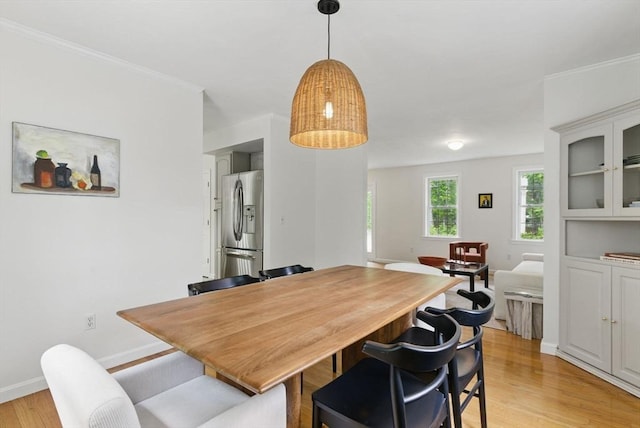 507 Towne St, North Attleboro, MA 02760 - dining room featuring light wood-style floors, baseboards, and ornamental molding