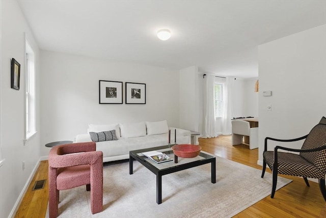 507 Towne St, North Attleboro, MA 02760 - living area with light wood-type flooring and baseboards