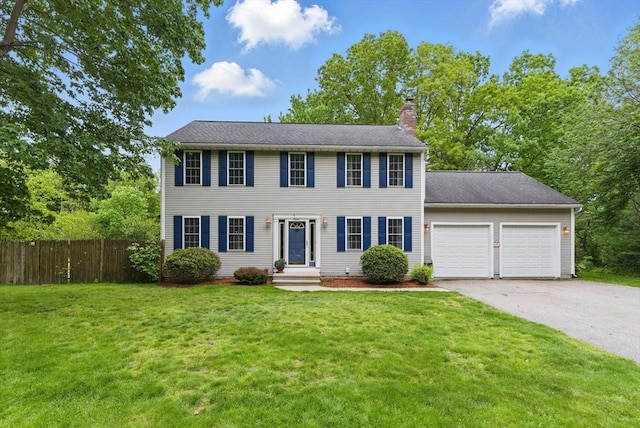 507 Towne St, North Attleboro, MA 02760 - colonial inspired home with a garage, a chimney, and driveway