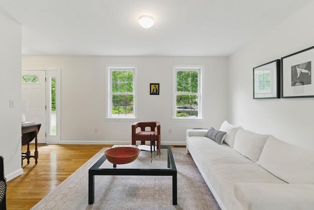 507 Towne St, North Attleboro, MA 02760 - living area with light wood-style flooring and baseboards