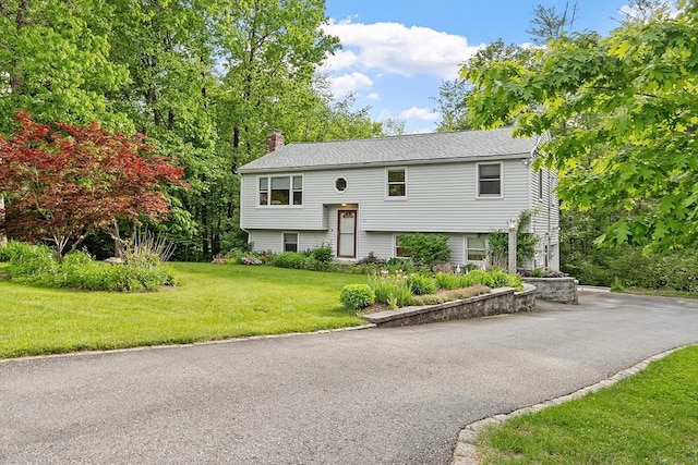 43 Edward Rd, Townsend, MA 01469 - split foyer home featuring a chimney and a front lawn