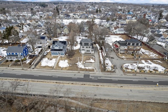 birds eye view of property with a residential view