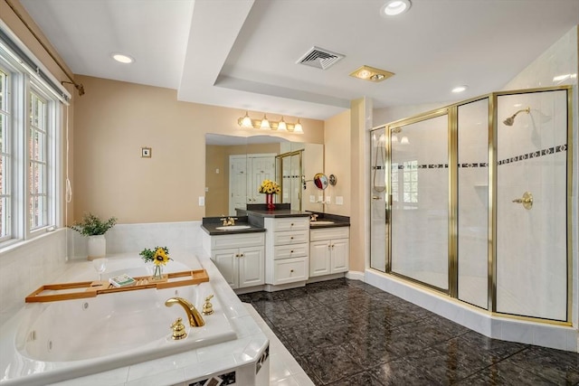 20 Peakham Rd, Sudbury, MA 01776 - bathroom featuring vanity, a jetted tub, recessed lighting, visible vents, and a stall shower