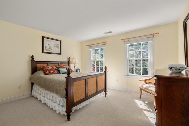 20 Peakham Rd, Sudbury, MA 01776 - bedroom with baseboards, light carpet, and visible vents