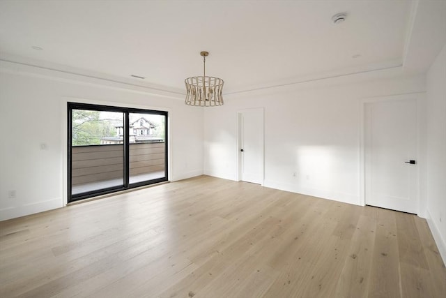 228 Auburn St Unit 228, Newton, MA 02466 - unfurnished dining area featuring a chandelier and light wood-style floors
