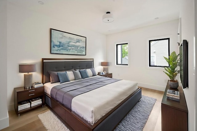 228 Auburn St Unit 228, Newton, MA 02466 - bedroom with light wood-style flooring and baseboards