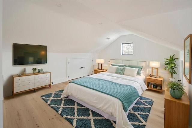 228 Auburn St Unit 228, Newton, MA 02466 - bedroom featuring lofted ceiling and light wood-style floors
