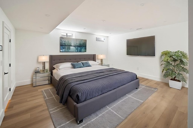 228 Auburn St Unit 228, Newton, MA 02466 - bedroom with light wood-style floors and baseboards