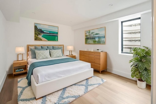 228 Auburn St Unit 228, Newton, MA 02466 - bedroom with baseboards and wood finished floors