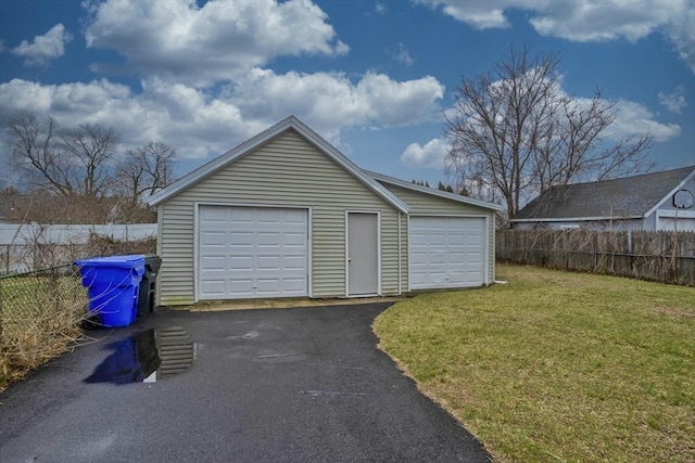 detached garage with fence
