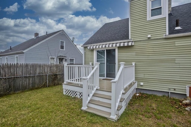 exterior space featuring a yard and fence