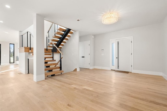 interior space with light hardwood / wood-style flooring