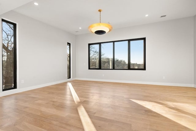 empty room featuring light hardwood / wood-style floors