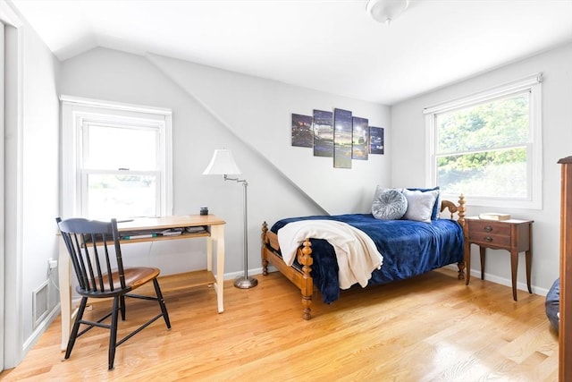 273 Greendale Ave, Needham, MA 02494 - bedroom with light wood-style floors and vaulted ceiling
