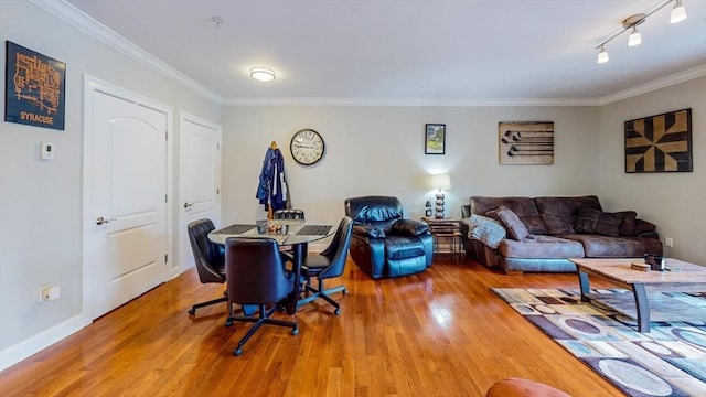 1100 Vfw Pkwy Unit 202, Boston, MA 02132 - living area featuring ornamental molding, wood finished floors, and baseboards