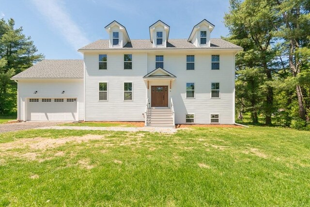 12 Willow St, Pepperell, MA 01463 - view of front of house with an attached garage, a front yard, and driveway
