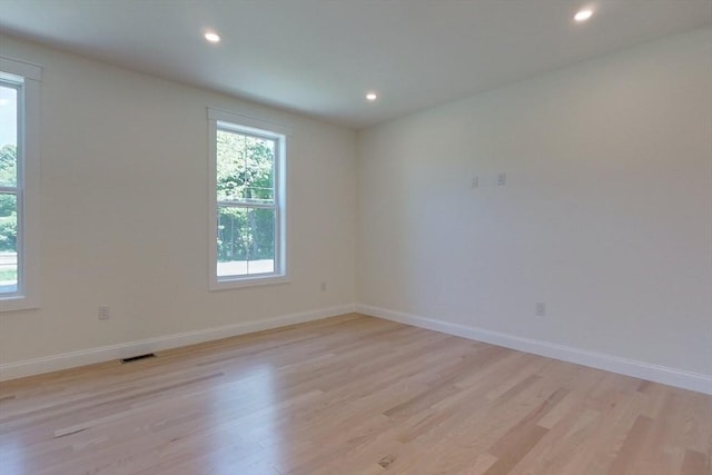 12 Willow St, Pepperell, MA 01463 - unfurnished room with healthy amount of natural light, light wood finished floors, recessed lighting, and baseboards