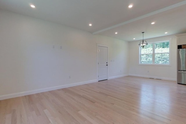 12 Willow St, Pepperell, MA 01463 - spare room featuring light wood-style flooring, a chandelier, baseboards, and recessed lighting