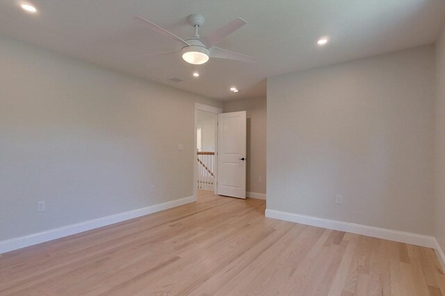 12 Willow St, Pepperell, MA 01463 - empty room with ceiling fan, light wood finished floors, baseboards, and recessed lighting
