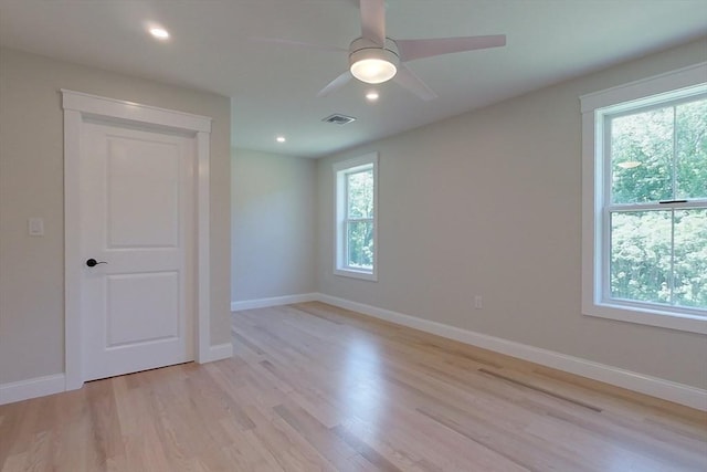 12 Willow St, Pepperell, MA 01463 - empty room with light wood-style flooring, baseboards, recessed lighting, and a ceiling fan