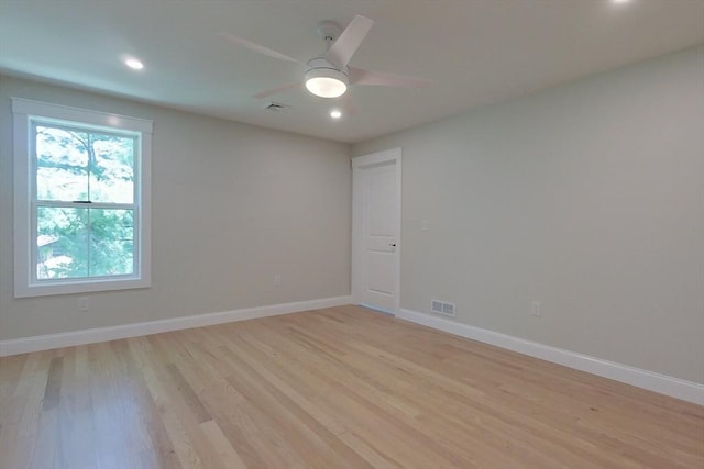12 Willow St, Pepperell, MA 01463 - empty room with light wood-style floors, recessed lighting, ceiling fan, and baseboards