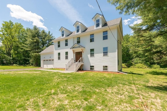 12 Willow St, Pepperell, MA 01463 - view of front of home featuring an attached garage and a front yard