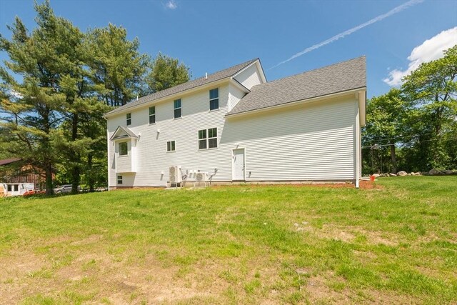 12 Willow St, Pepperell, MA 01463 - back of house with a lawn
