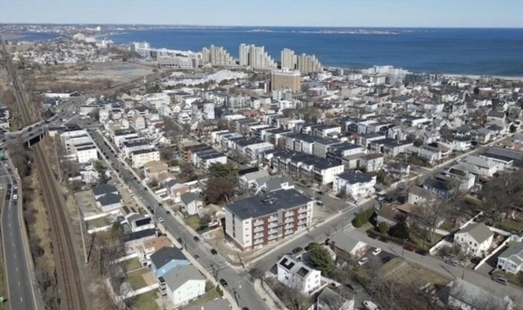 10 Franklin Ave Unit G10, Revere, MA 02151 - aerial view of property and surrounding area with nearby urban area and a large body of water