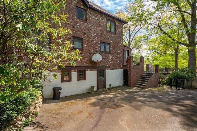 view of property with stairs