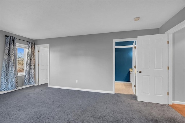 unfurnished room with carpet