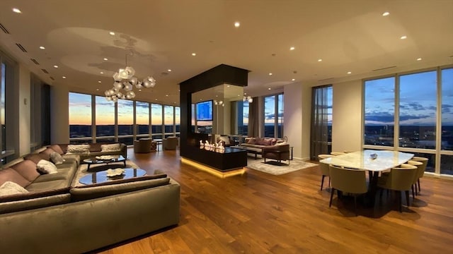 building lobby with floor to ceiling windows and recessed lighting