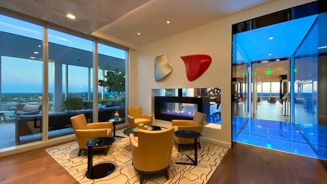 building lobby featuring expansive windows and recessed lighting