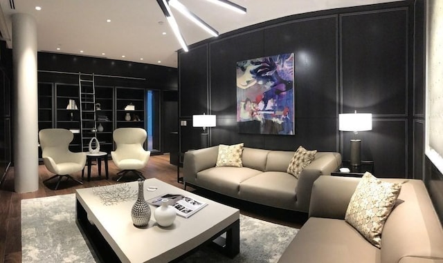 cinema room with wood finished floors