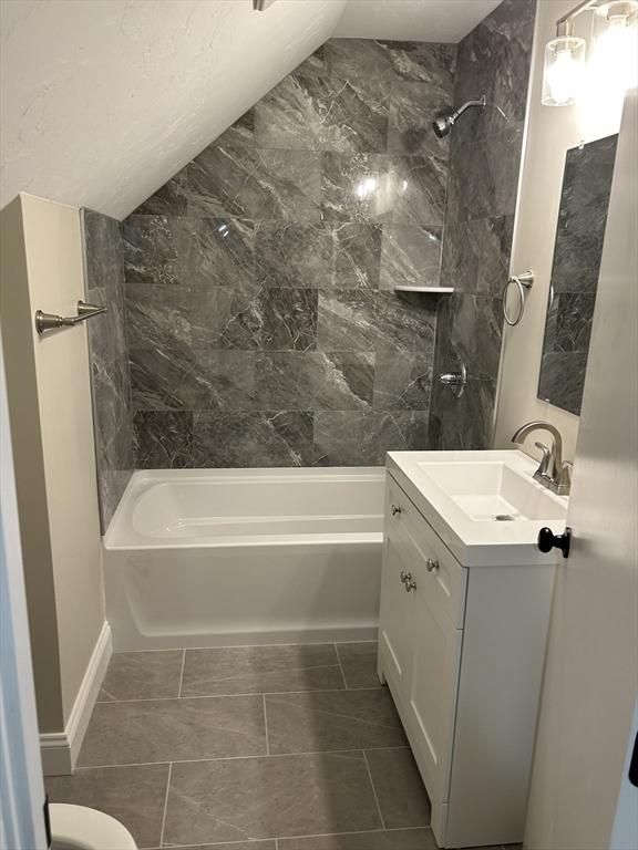 full bath with shower / washtub combination and vanity