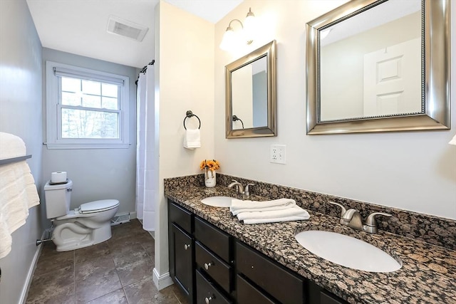 full bathroom with toilet, a sink, visible vents, and baseboards