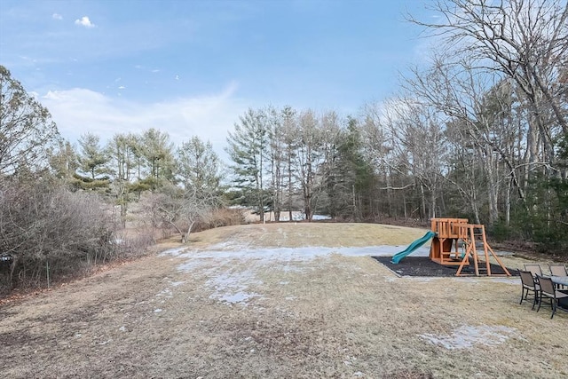 view of yard featuring playground community