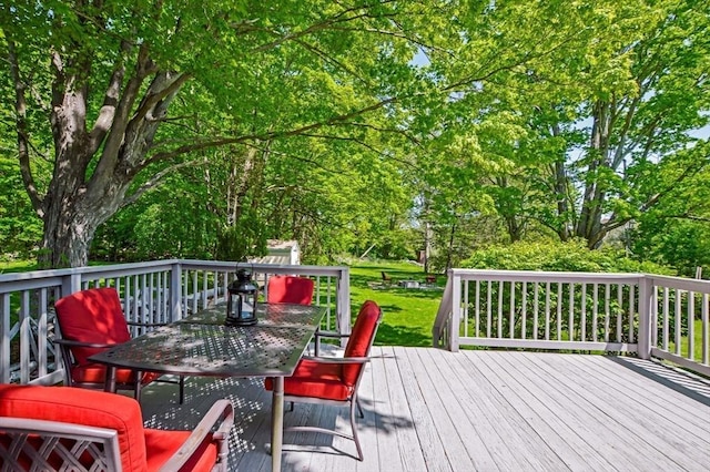 130 N Walker St, Taunton, MA 02780 - wooden deck featuring outdoor dining area and view of scattered trees