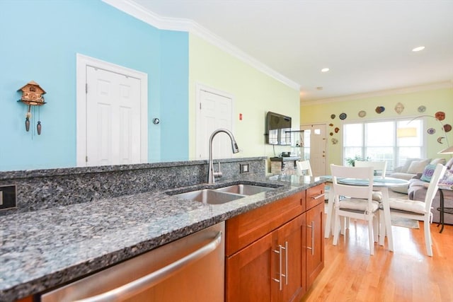 41 Oak St Unit 2, Waltham, MA 02453 - kitchen featuring stainless steel dishwasher, brown cabinets, dark stone counters, light wood finished floors, and ornamental molding